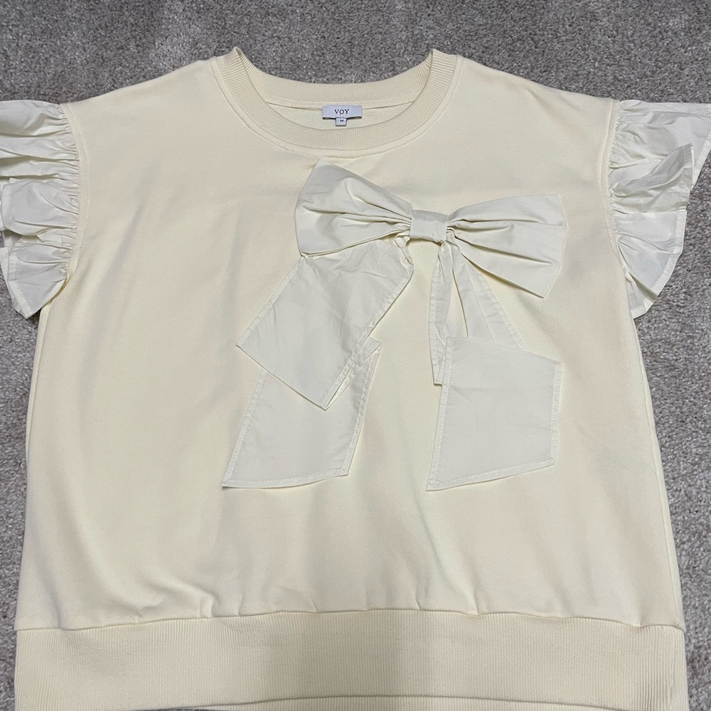 Cream Top with Bow Detail and Ruffle Sleeves